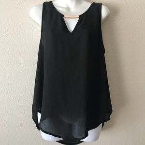 Simple black top with gold bar across front.